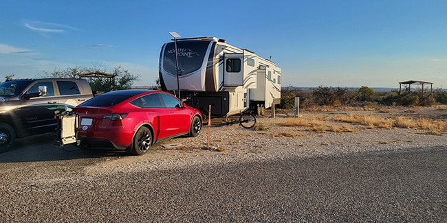 Our truck, 5th wheel, and Tesla Model Y at Seminole Canyon State Park campground